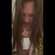 Emi stands in a black top with her bare ass to the camera and spreads her rotten egg stink, then leans in close to the camera and makes faces. Vertical format video. Over 17 minutes.